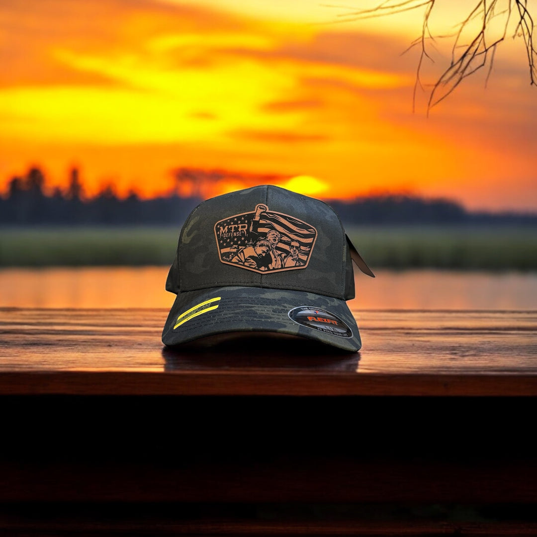 MTR Defense “Just a Flesh Wound” On Tour Black Multicam Flexfit Baseball Cap  Limited Run Available.